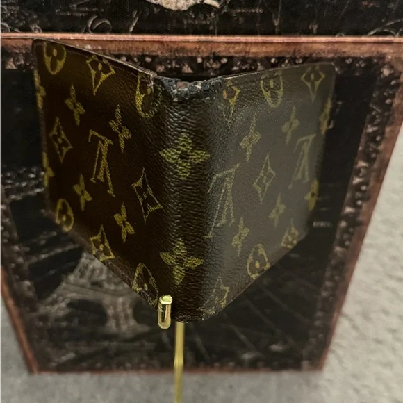 Louis Vuitton men’s multiple monogram wallet.